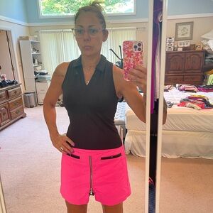 New, never worn, collared, racerback golf shirt with built in bra by Kyodan!